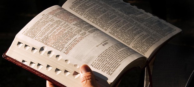 holding Bible
